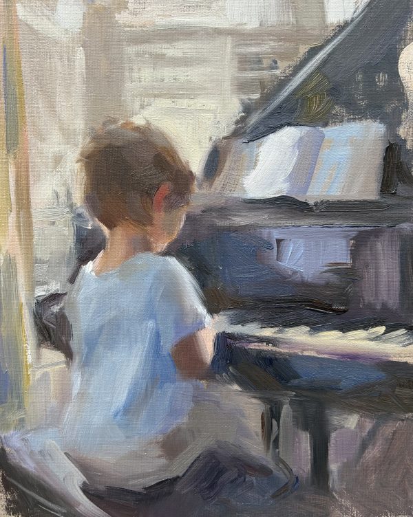 Boy in blue at the piano